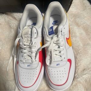 Nike Air Force 1 White Sneakers with Red and Orange Accents